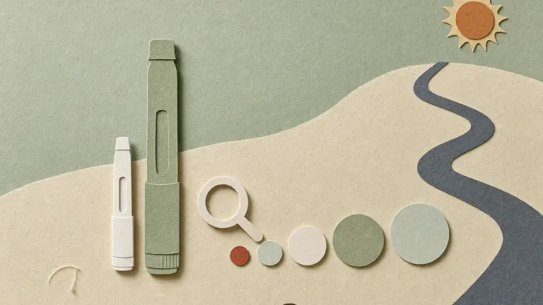 Layered paper-cut collage of a small injection pen beside a larger one, graduated dose circles and a magnifying glass.